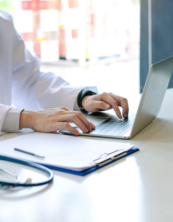 young-male-doctor-asian-working-with-laptop-in-the-2023-01-16-22-33-55-utc
